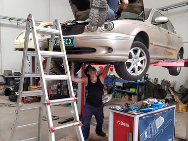 Jaguar X-Type has 2 sensors replaced prior to import test Jaguar X Type in workshop